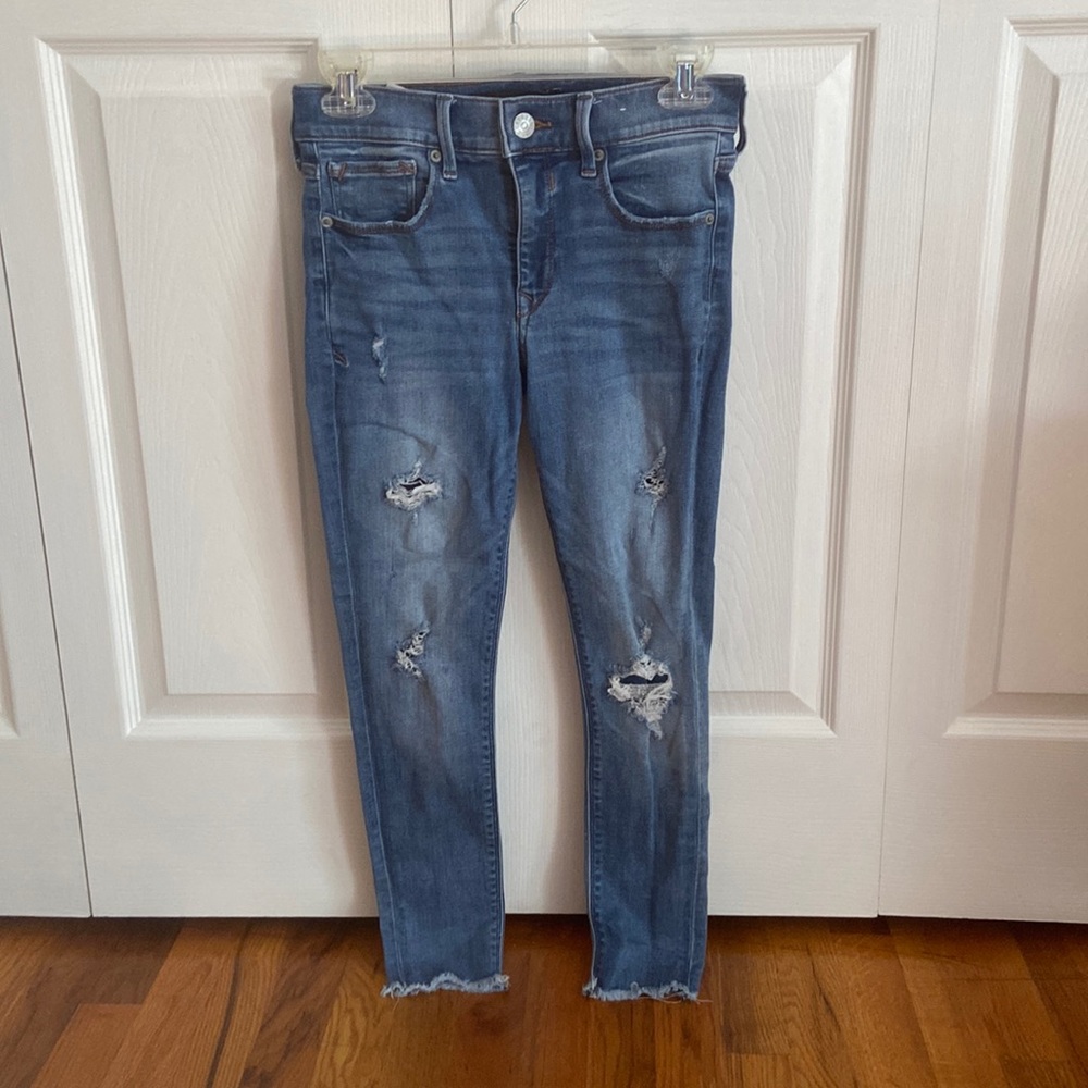 Express jeans (women’s) size 0 short, ripped with patches